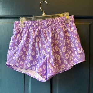 All in Motion• Purple leopard print athletic shorts